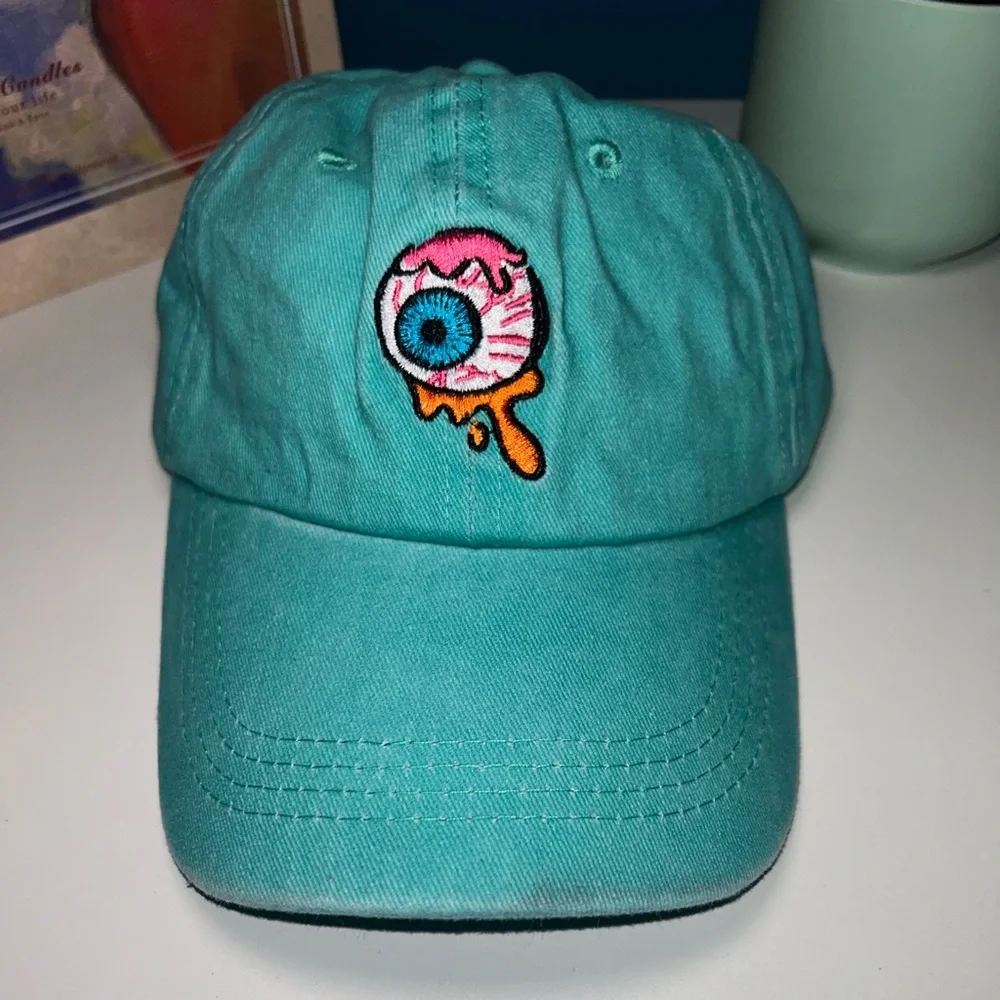 WOMENS TEAL CAP WITH EYEBALL EMBROIDERY
